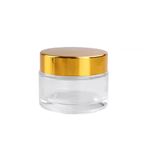 Frasco de vidro transparente com tampa de alumínio dourado 50ml